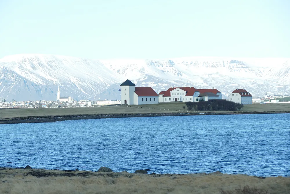 Bessastadir, the official residence of Iceland's president, with Reykjavik in the background, 5 April 2019.