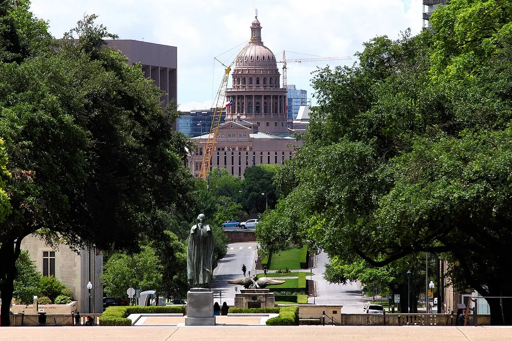 The Texas State Capitol dome seen from the South Mall of the University of Texas at Austin, 26 May 2020.
