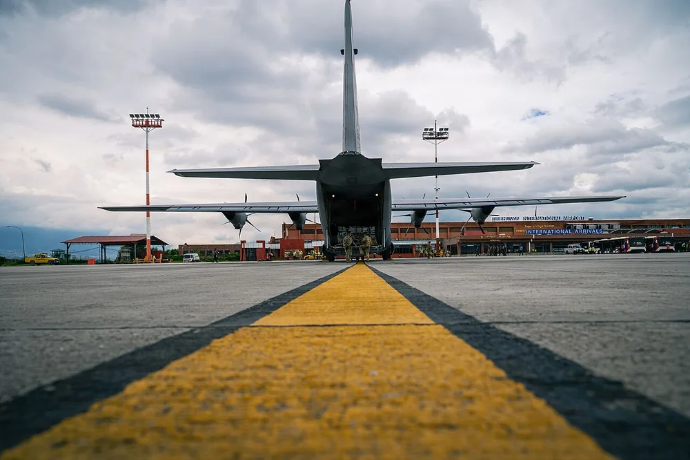A U.S. Air Force C-130J Super Hercules on the flight line at Tribhuvan International Airport, Kathmandu, Nepal, after delivering relief supplies, 2 September 2026.