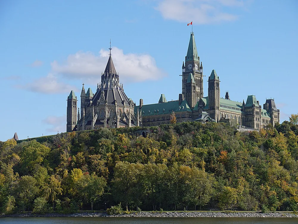 Parliament Hill in Ottawa seen from the Ottawa River.