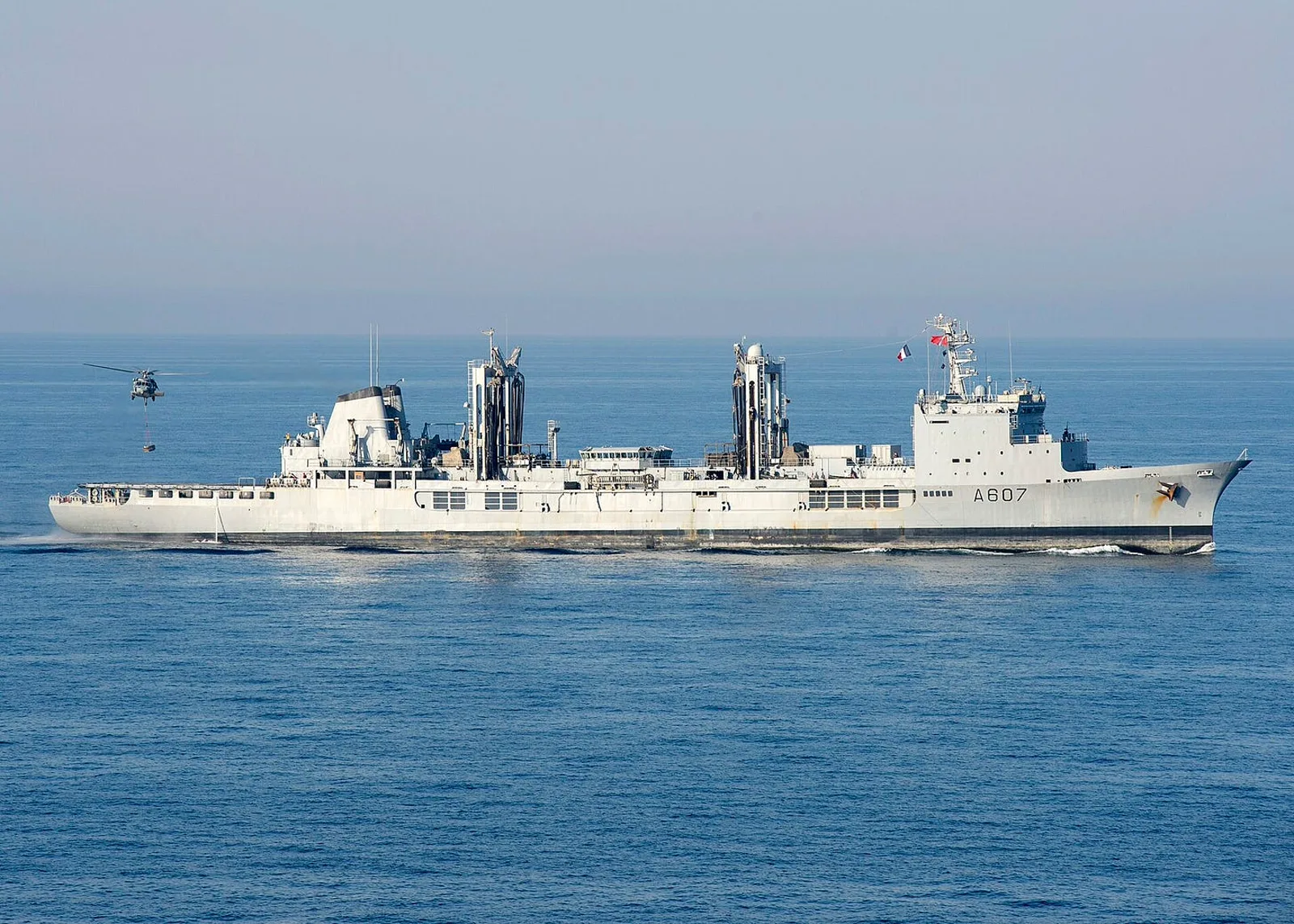 A replenishment oiler transits the Arabian Sea during vertical replenishment. Photo: U.S. Navy, public domain.