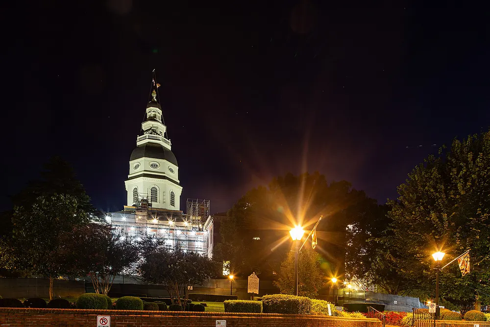 The Maryland State House dome in Annapolis at night, with scaffolding around the cupola. Photo: Wikimedia Commons.