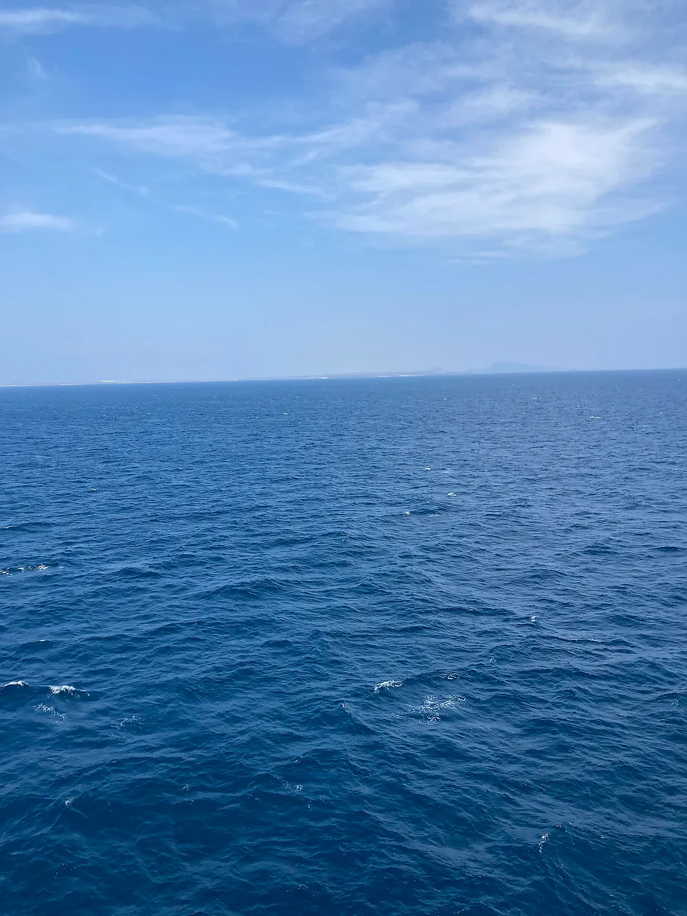 Surface view across the Bab el-Mandeb Strait toward the distant shore. Photo: Richard Weil / Wikimedia Commons, CC0.
