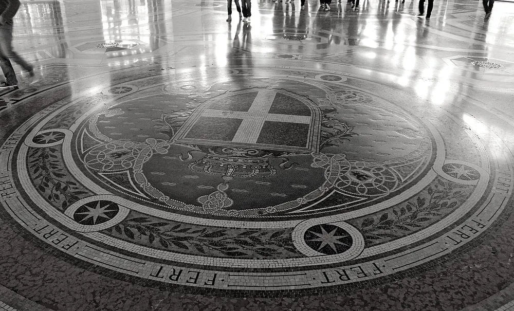 The mosaic floor of Galleria Vittorio Emanuele II in Milan. Photo: Fidel Amos / Wikimedia Commons, CC BY-SA 4.0.